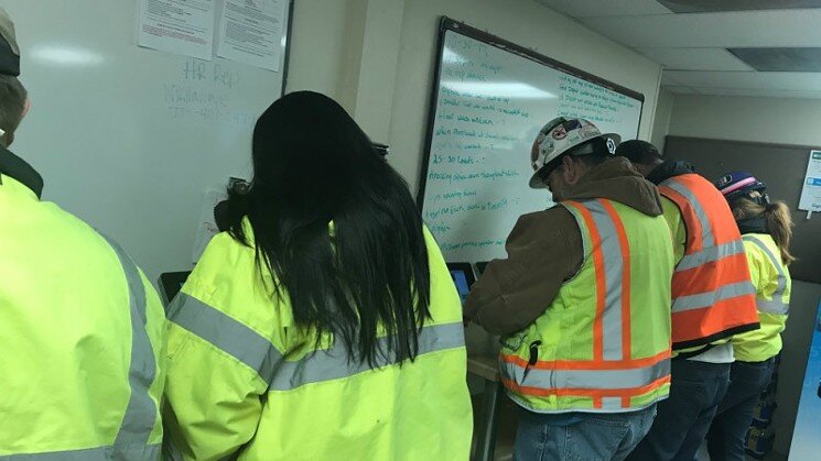 A construction crew performs the Alert Meter test before heading to the job site.